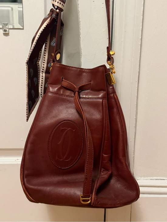 Cartier Handbags - Cartier Brown Leather Drawstring Crossbody Bag